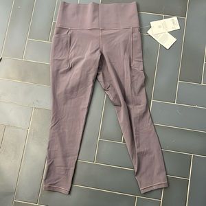 Athleta Salutation Stash Tight 7/8 Leggings